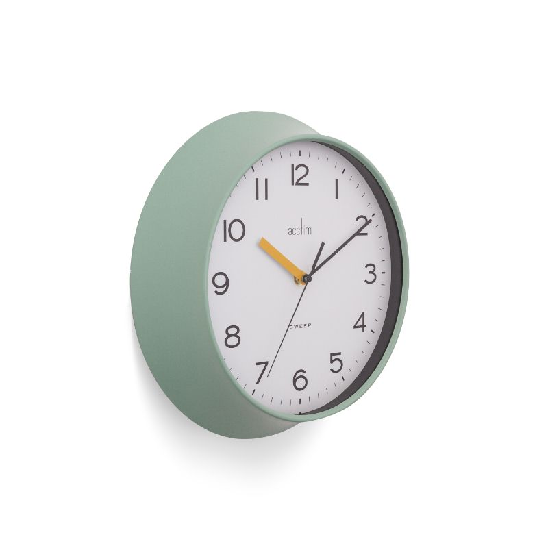 Dusty cool mint wall clock with bold numbers, retro design, and stylish pastel finish, measuring 29cm in diameter.