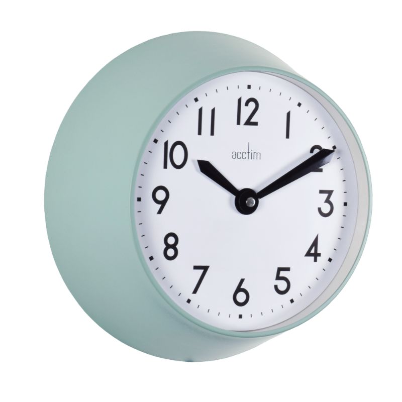 Matt green metal wall clock with retro design, quartz movement, and glass lens, perfect for home decor.