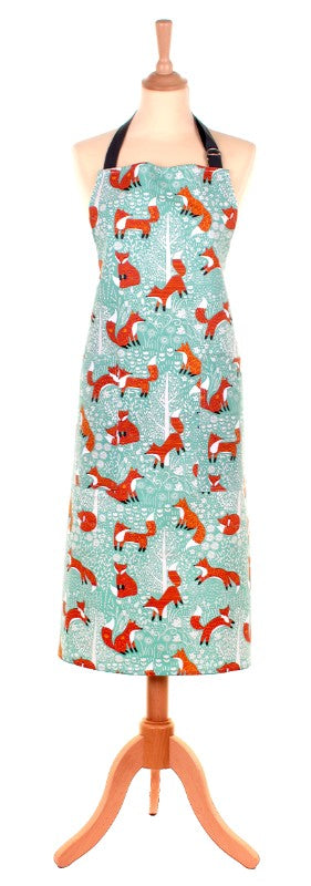 Vibrant Ulster Weavers Cotton Apron featuring a whimsical fox design on a duck egg shell background, with adjustable ties and a front pocket.