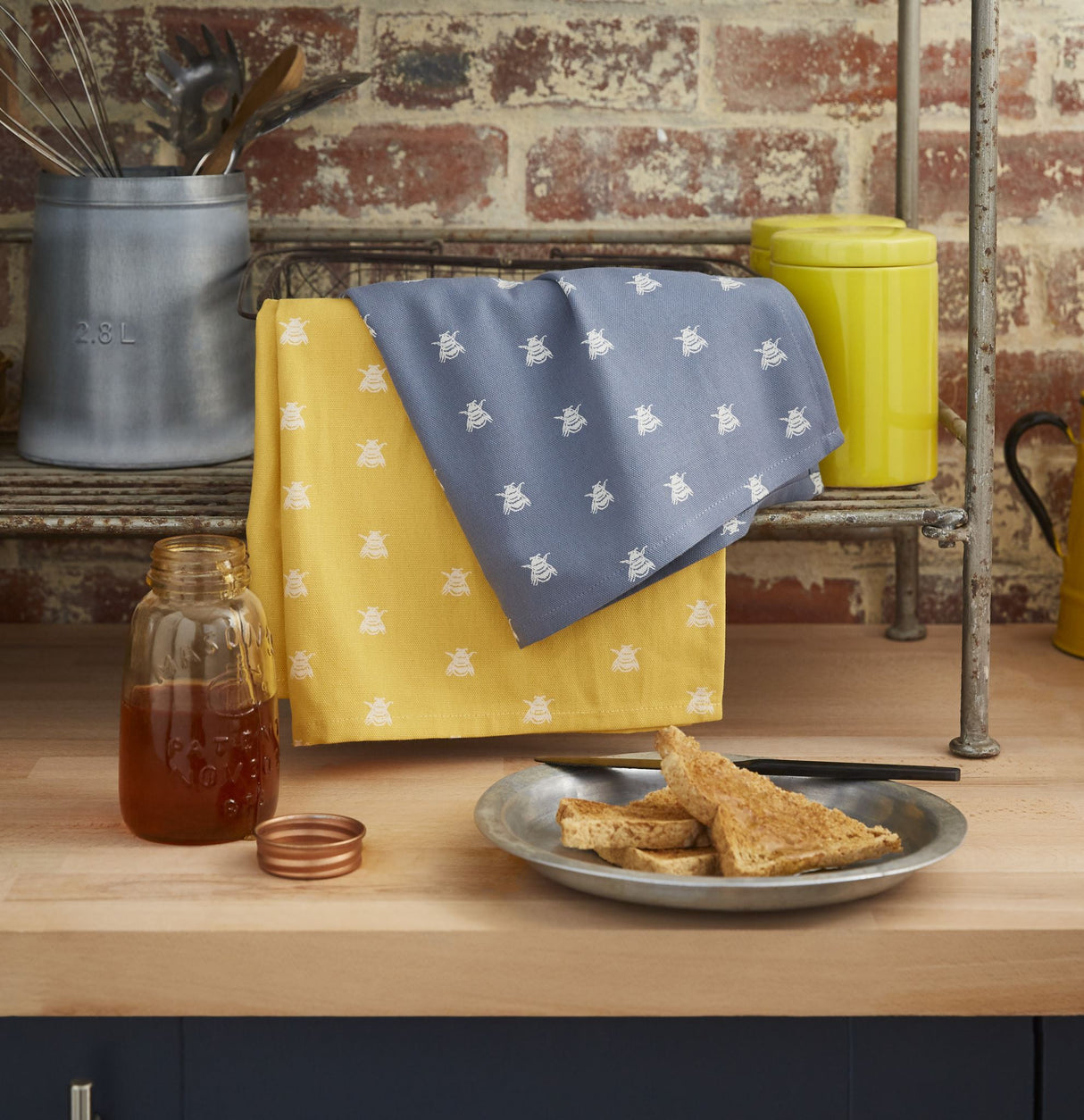 Ulster Weavers Bee Cotton Tea Towels, 48x74cm, featuring absorbent fabric and elegant bee motif, perfect for kitchen decor.