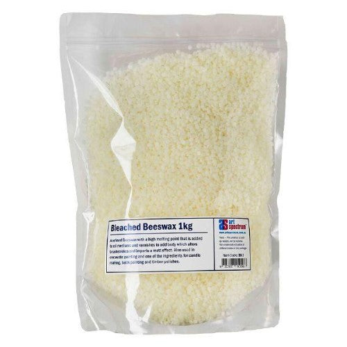 Refined white beeswax pellets ideal for encaustic painting, candlemaking, and vibrant DIY projects.