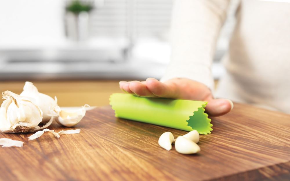 Silicone garlic peeler by Zeal, designed for easy, mess-free peeling of garlic cloves with a flexible tube.