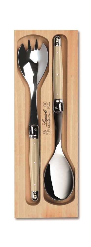 Elegant ivory Laguiole salad server set with hand-crafted fork and spoon, perfect for stylishly serving salads.
