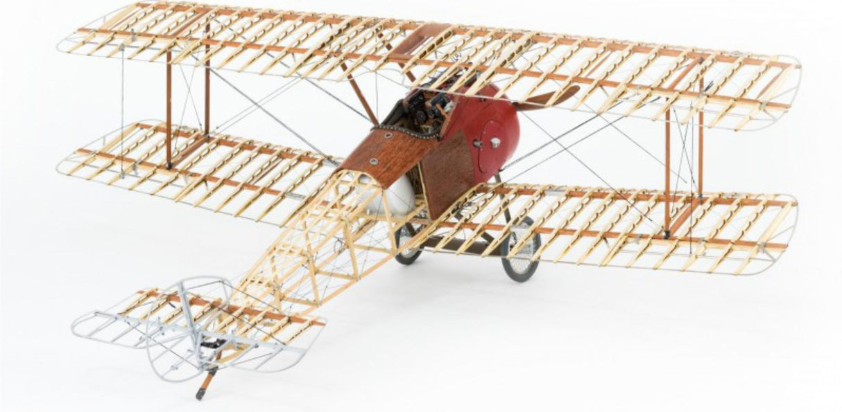 Detailed wooden and metal model kit of the Sopwith F.1 Camel, complete with display stand and cockpit features.