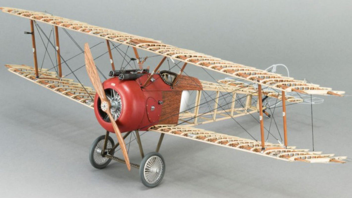 Detailed wooden model kit of the Sopwith F.1 Camel, featuring a 20.86'' wingspan and elegant display stand.