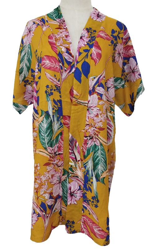 Mustard kimono featuring a vibrant flower and leaves print, perfect for layering with a relaxed, flowy fit.