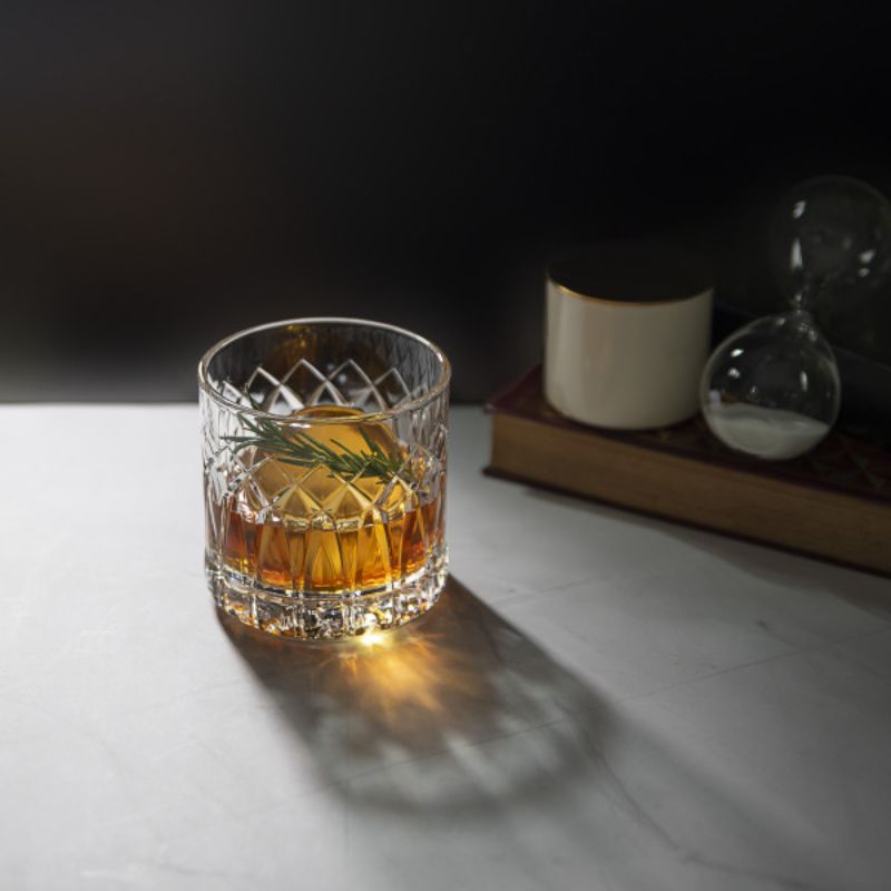 Set of 6 Ocean Traze 350ml whisky glasses featuring intricate cut crystal designs, perfect for elegant sipping and décor.