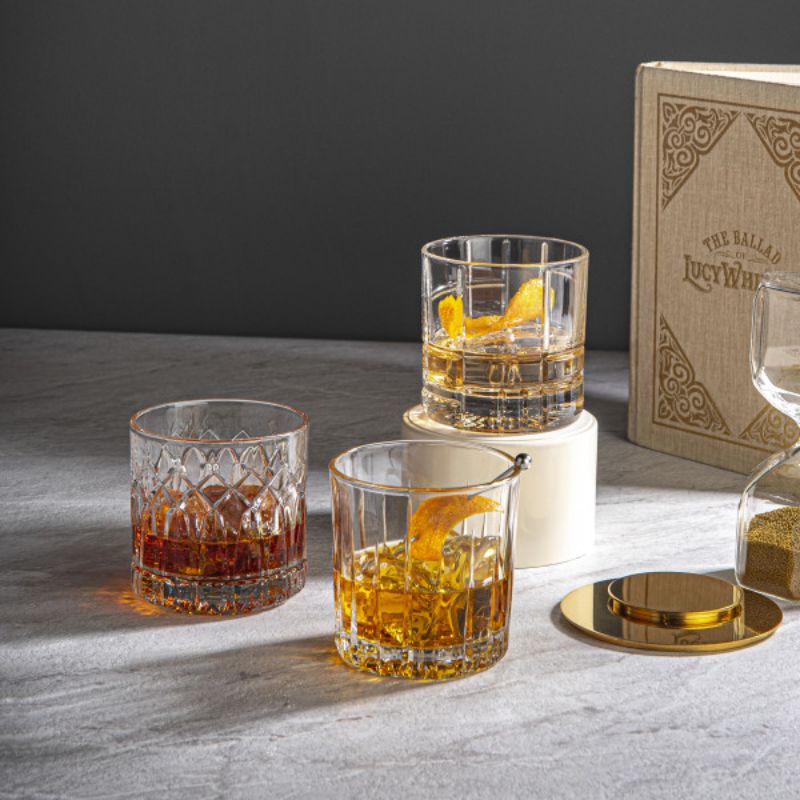 Set of 6 Ocean Traze whisky glasses featuring unique cut crystal designs, perfect for modern whisky enjoyment.