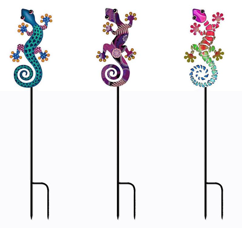 Set of 12 colorful metal lizard garden stakes, 56cm tall, perfect for enhancing garden decor with whimsical designs.