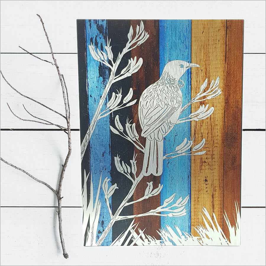 Aged timber wall art featuring a vibrant Tui bird design, measuring 42cm, perfect for enhancing any interior space.
