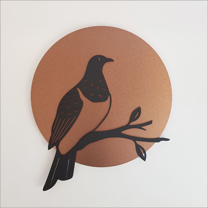 Brushed copper and black acrylic wall art featuring a kereru silhouette, perfect for indoor and outdoor decor.