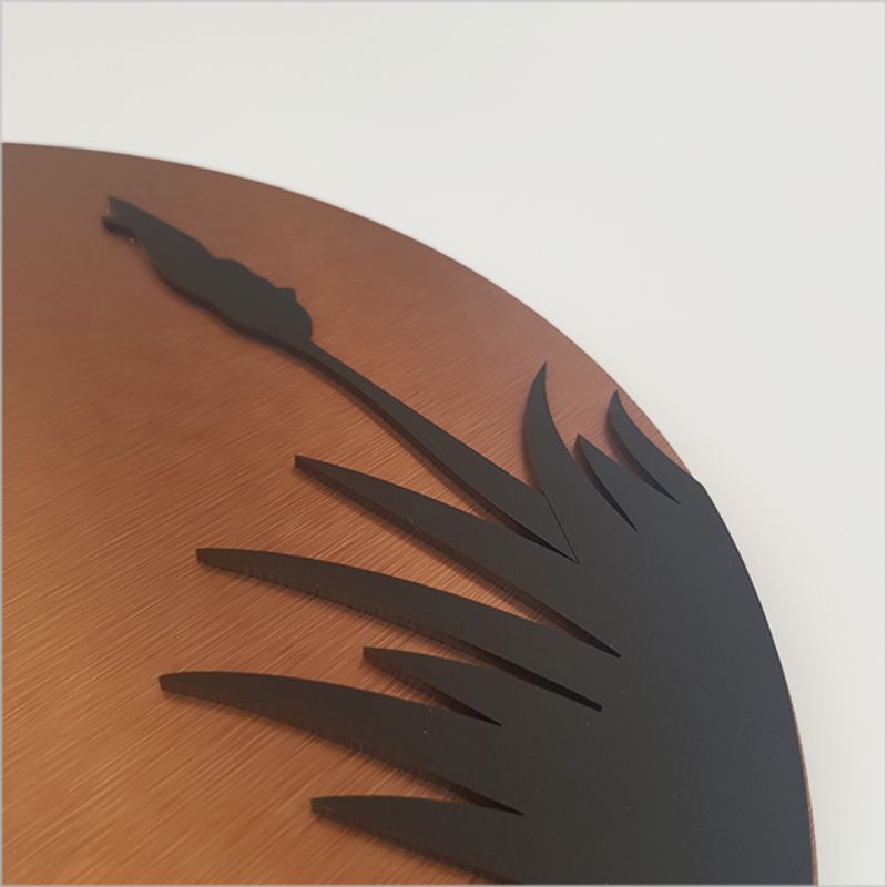 Copper circle wall art featuring a Pukeko design, crafted in brushed copper and black acrylic, 37cm diameter.