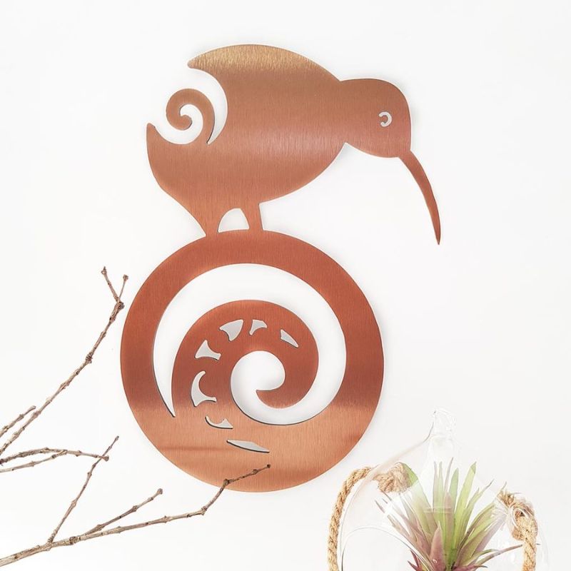 Brushed copper wall art featuring a kiwi bird and Koru motif, perfect for enhancing any indoor or outdoor space.