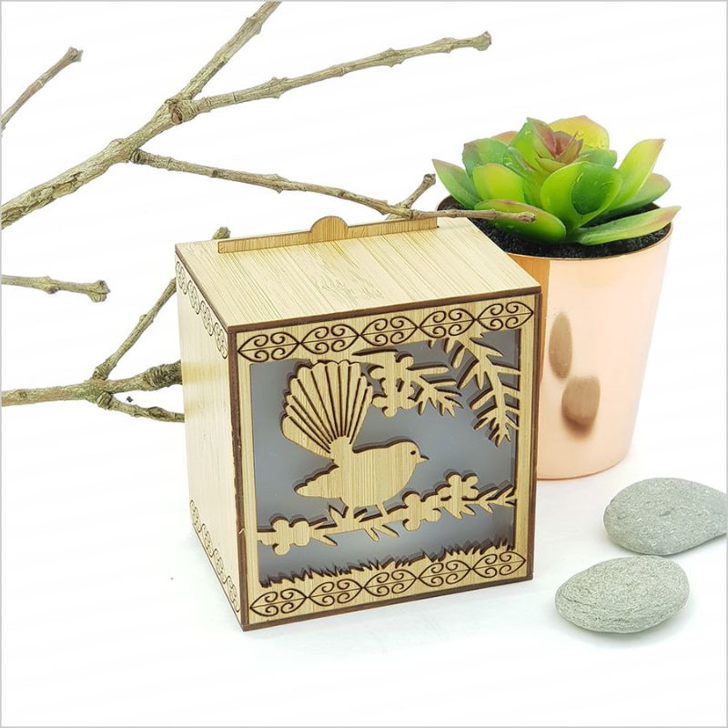Elegant LED tealight candle box in bamboo featuring a fantail design, with color-changing options for a cozy ambiance.