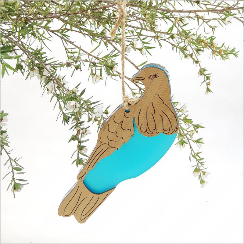 Hanging Kereru ornament made of bamboo and teal acrylic, beautifully crafted and eco-friendly at 96mm x 118mm.