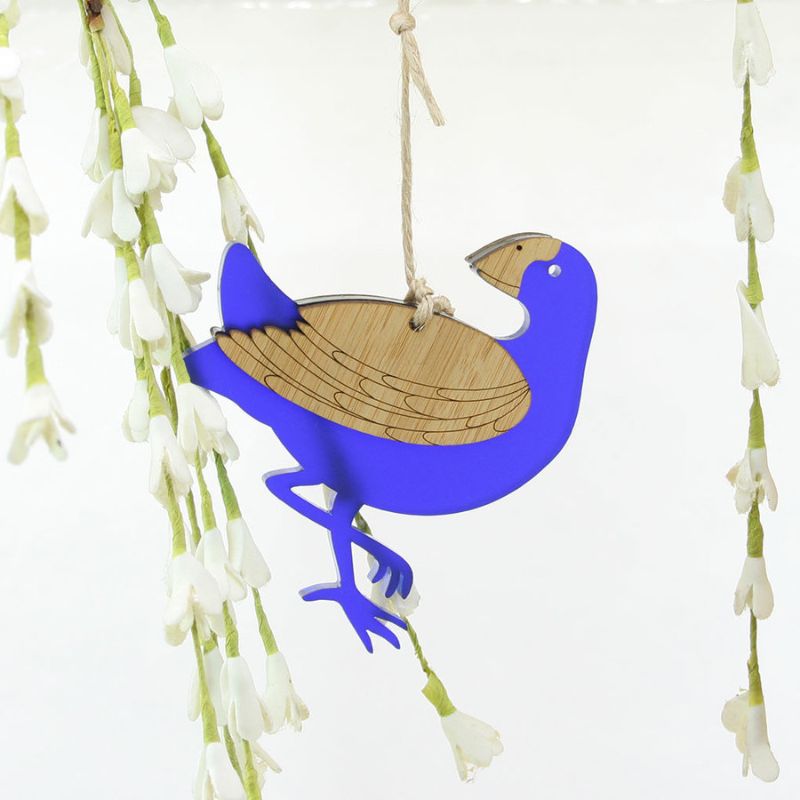 Hanging Pukeko ornament made from laser-cut bamboo with blue satin acrylic, perfect for festive decor and eco-friendly gifting.