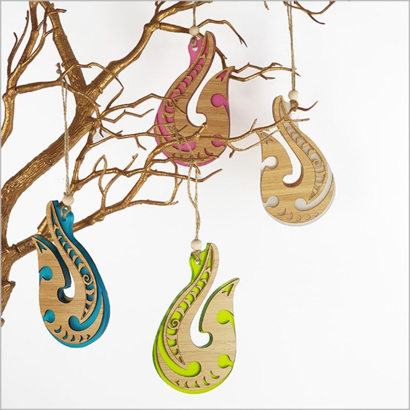 Elegant red satin acrylic hanging ornament featuring laser-cut bamboo, perfect for festive decor or thoughtful gifting.