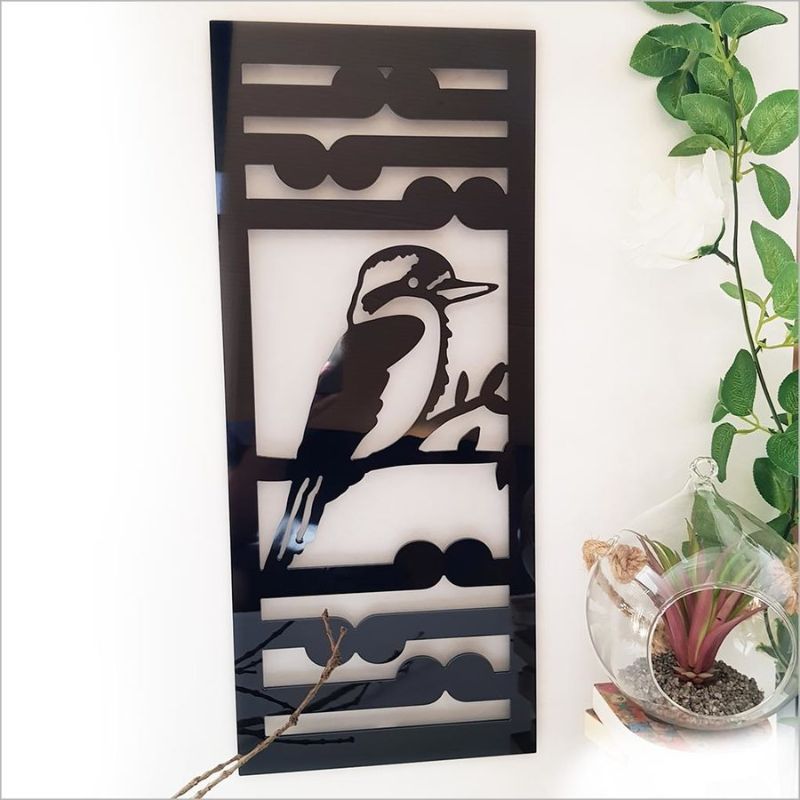 Elegant black wall art panel featuring a kingfisher and koru, perfect for indoor/outdoor decor, measuring 55cm in height.
