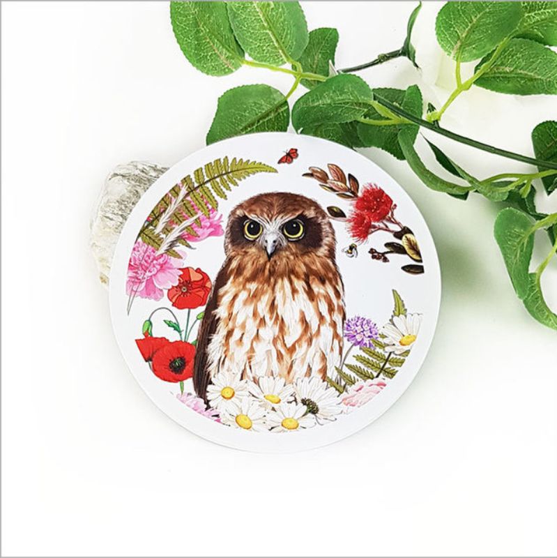 Vibrant circular wall art featuring Ruru and flora, printed on durable foam PVC, perfect for home decor.