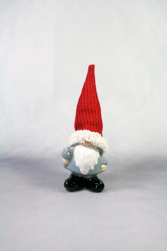 Small grey ceramic Santa figurine with red woollen hat, 20cm tall, perfect for festive home decor and holiday gifting.