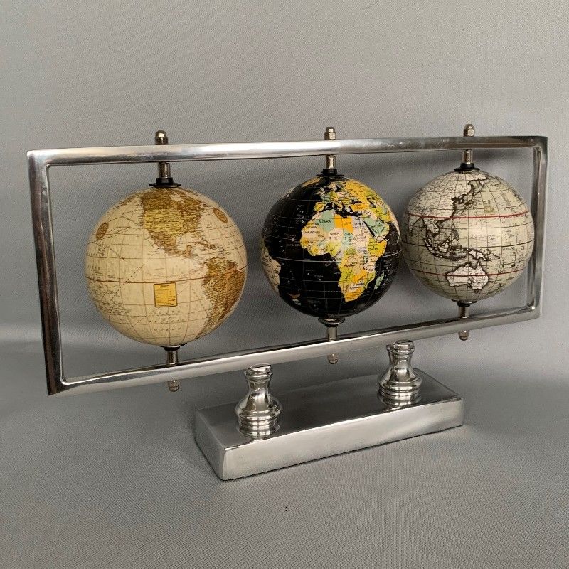 Elegant triple globes on a stylish frame, perfect for modern home decor and thoughtful gifting.