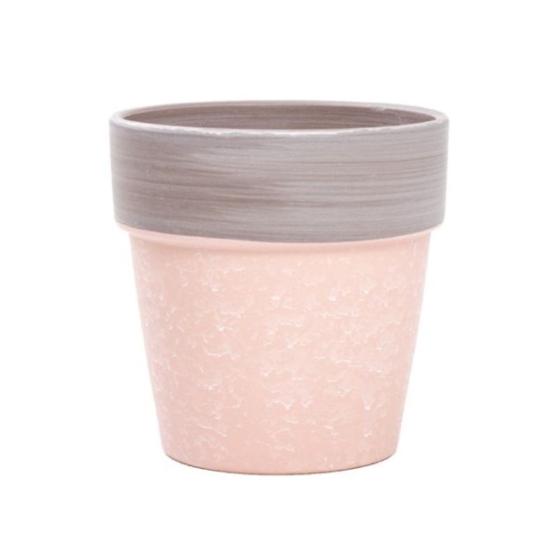 Ceramic terracotta pot in soft pink, measuring 14x13.5cmH, perfect for showcasing indoor plants and floral arrangements.