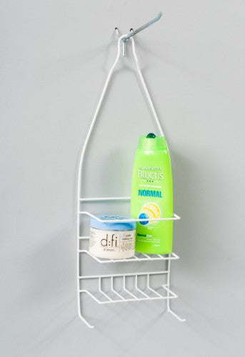 Small white wire shower caddy hanging over a shower rose, organizing bath essentials with a stylish and compact design.