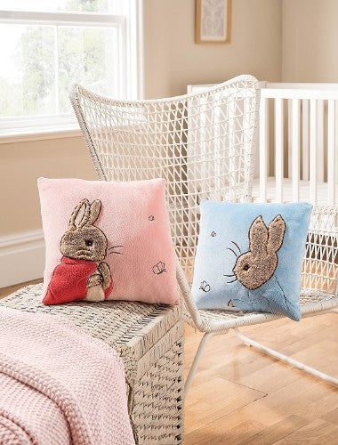Floppy Bunny Cushion featuring Beatrix Potter illustrations, soft fabric for comfort, perfect for nurseries and imaginative play.