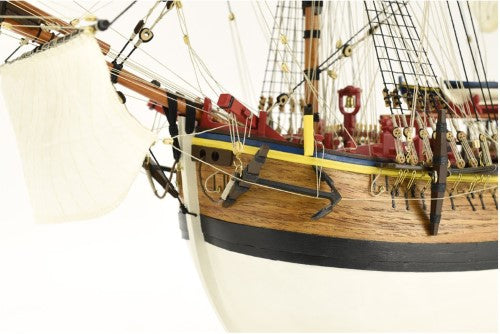 Wooden model kit of the HMS Endeavour at 1/65 scale, showcasing historical accuracy and 18th-century construction techniques.