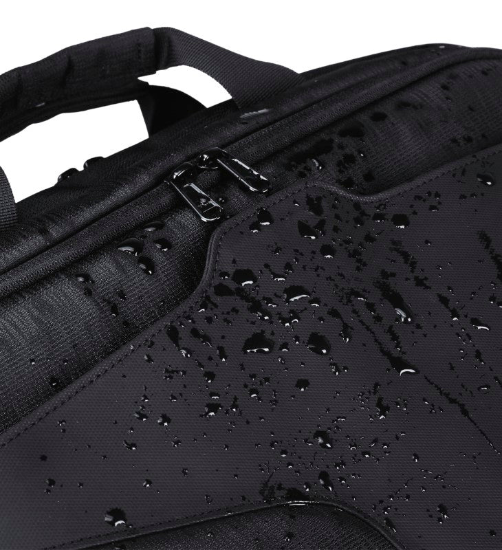 Durable water-resistant laptop bag with USB charger port, padded compartments, and organizer pockets for modern professionals.