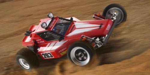 Retro R/C buggy inspired by the iconic Tomahawk, featuring an aluminum chassis, high-grip tires, and advanced performance technology.