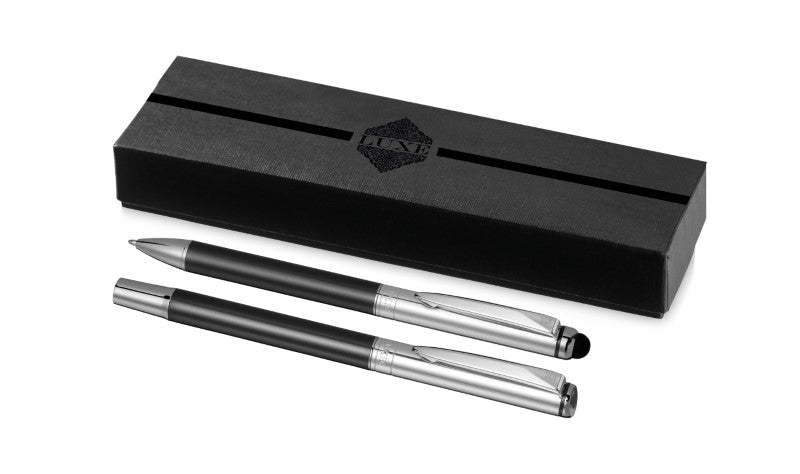 Elegant Luxe Vincenzo Pen Set featuring a roller ball and twist-action pen, in a stylish gift box with graphite and chrome finishes.