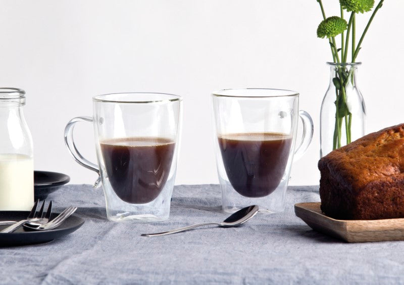 Elegant double-walled glass coffee cups, 310ml, showcasing rich aromas, perfect for hot beverages, in a stylish gift box.