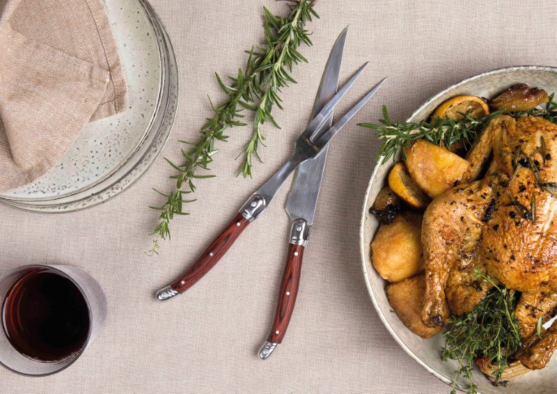 "Elegant Bordeaux Carving Set with stainless steel knife and fork, featuring pakkawood handles, presented in a stylish gift box."
