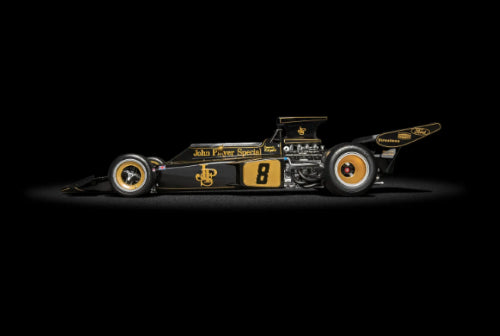 Alt text: Detailed 1/8 scale model of the iconic Lotus 72 F1 car, showcasing its sleek design and realistic features.