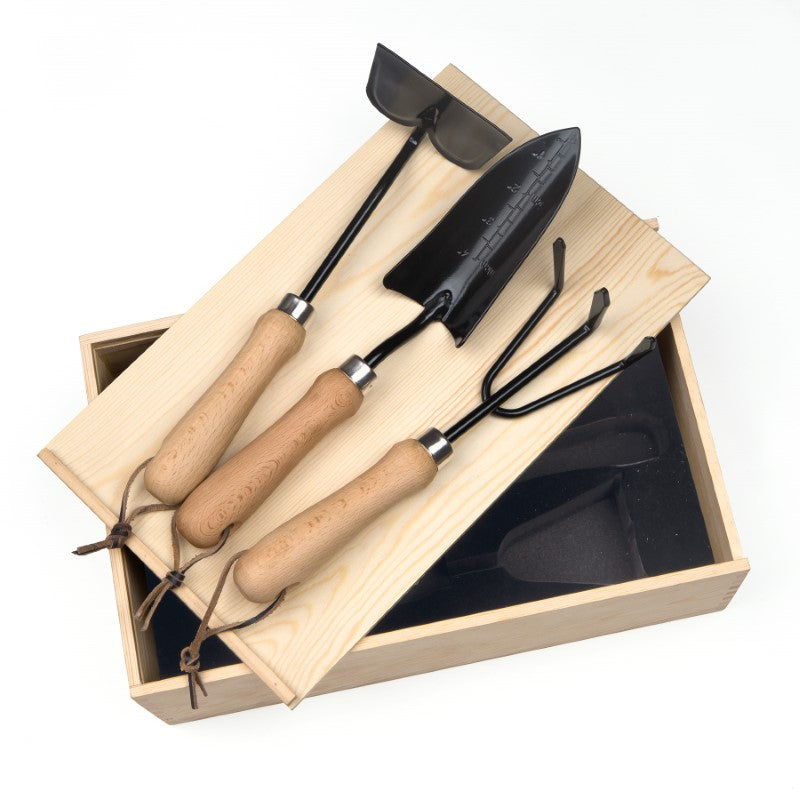 Premium 3-piece stainless steel garden tool set in a natural pine box, ideal for gardening enthusiasts.