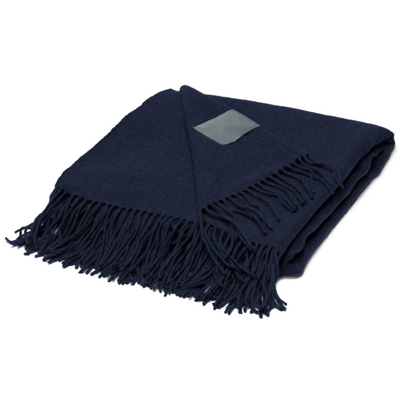 Luxurious Mt Lodge Merino Blanket Throw in soft herringbone weave, perfect for cozy nights and elegant home decor.