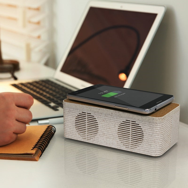 Natural wireless speaker charger made from sustainable materials, featuring 5W audio, Bluetooth V5.0, and eco-friendly design.