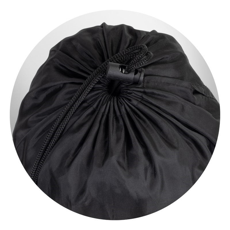 Cozy black puffer blanket with water-resistant fabric, plush foam fill, and drawstring pouch for easy transport and outdoor use.