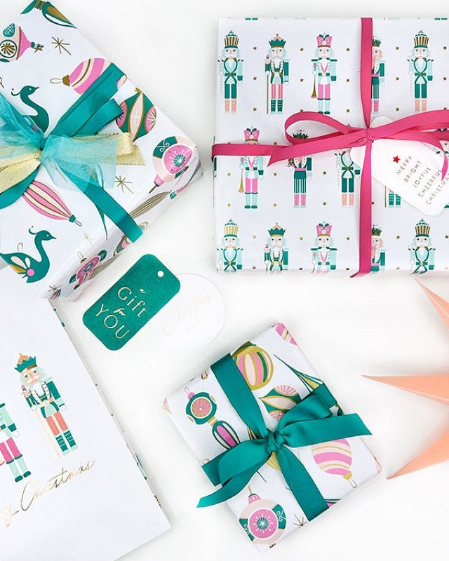 Nutcracker and Stars wrapping paper in jade, pink, peach, and gold; 40m of durable, elegant 80gsm paper for gifts.