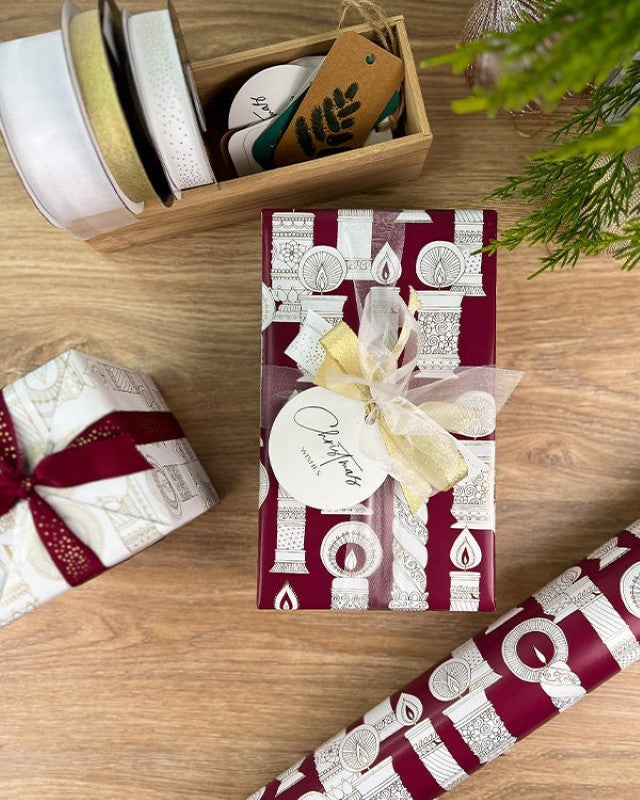 Elegant burgundy and gold vintage wrapping paper, perfect for special gifts and celebrations, measuring 600mm x 40m.
