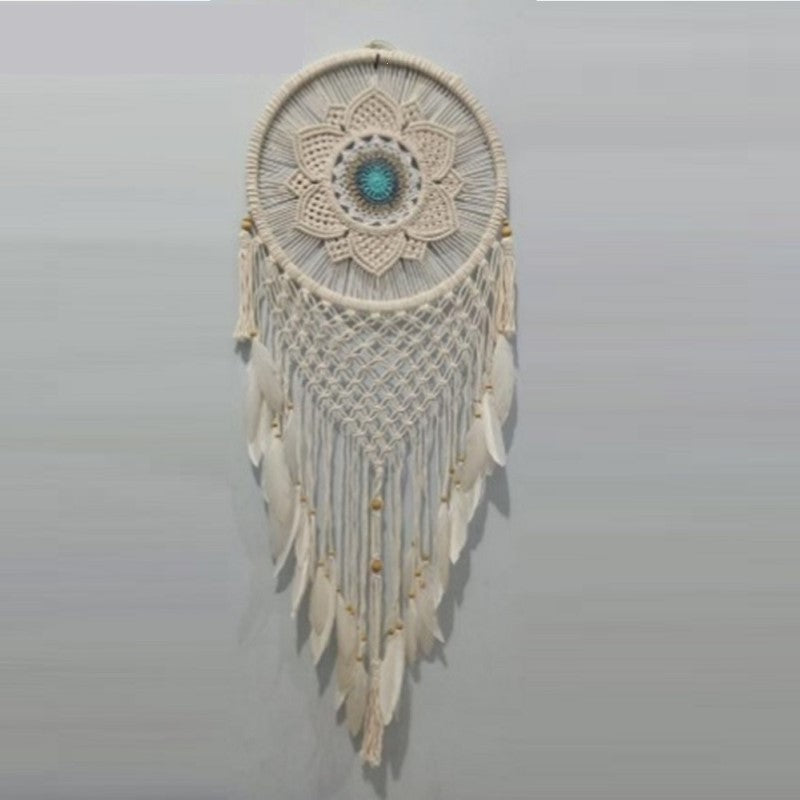 Natural 40cm dreamcatcher adorned with teal flowers, feathers, and twine, perfect for home decor and spiritual protection.