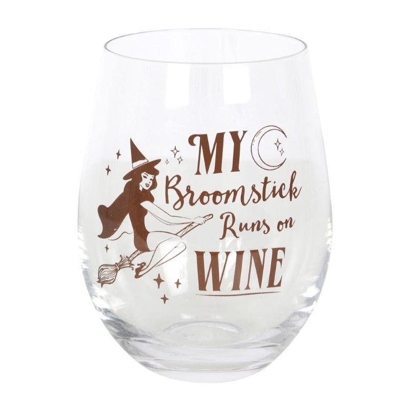 Whimsical stemless glass featuring a flying pin-up witch and the phrase "My broomstick runs on wine," holding 500ml.