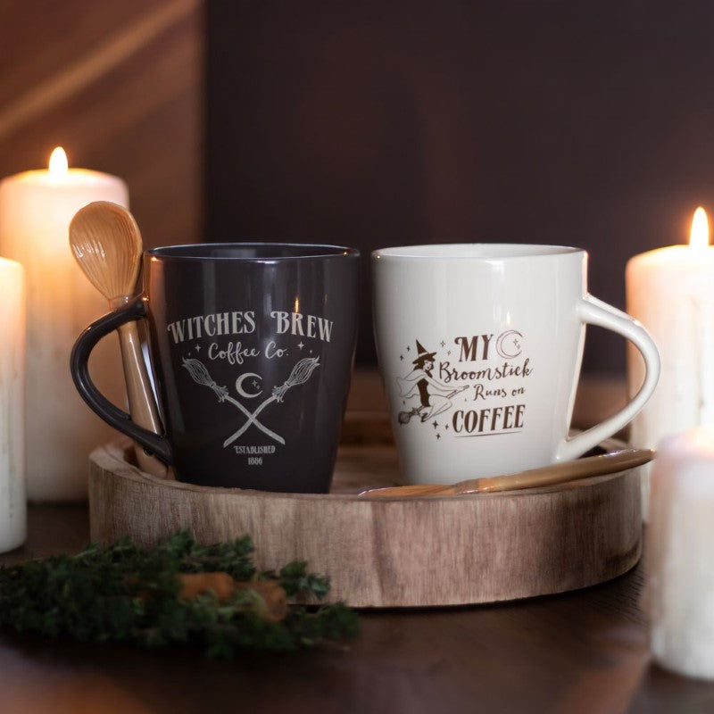 Enchanting coffee mug with flying pin-up witch and "My broomstick runs on coffee" text, includes matching broom teaspoon.