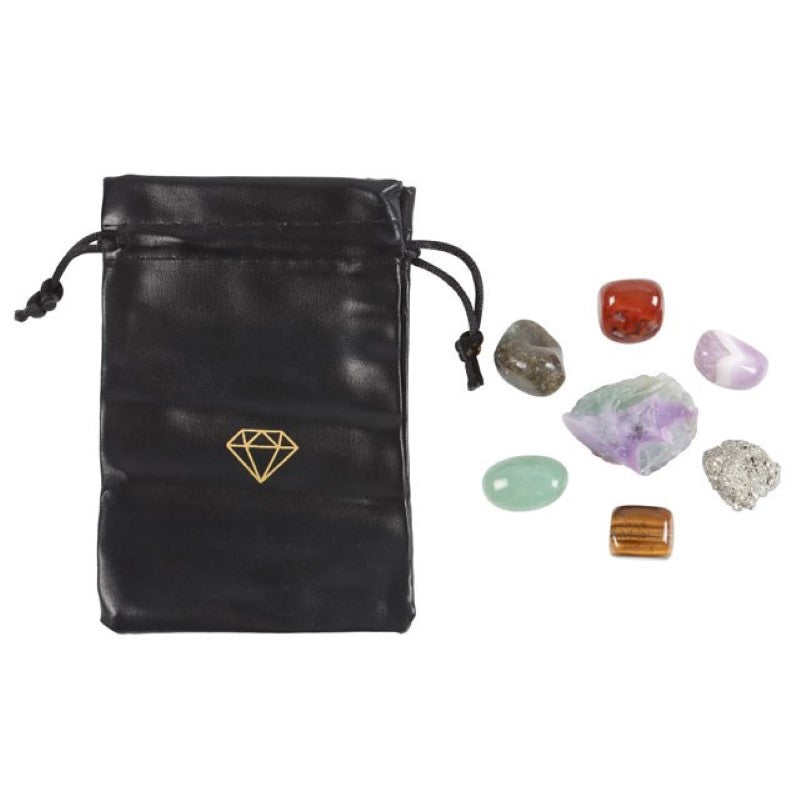 Manifestation Crystal Gift Set featuring 7 natural crystals in a faux leather bag for attracting abundance and inner peace.