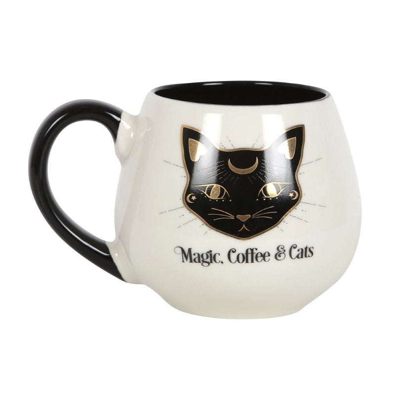 Ceramic mug featuring a mystical black cat design and 'Magic, Coffee & Cats' text, perfect for cat lovers and coffee enthusiasts.