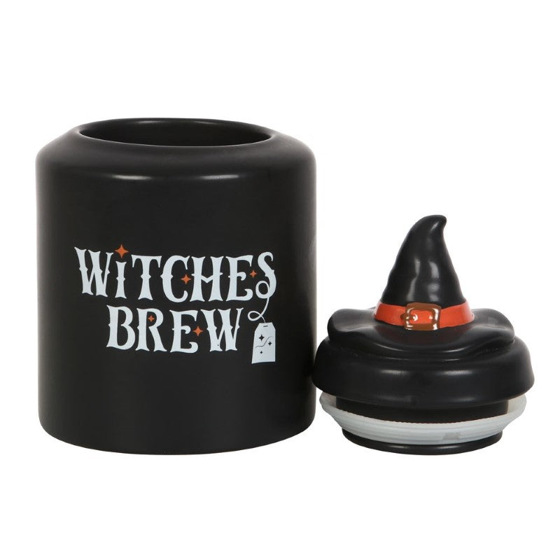 Witches Brew Jar with whimsical text and witch hat lid, ideal for storing teabags or trinkets. Perfect Halloween decor!