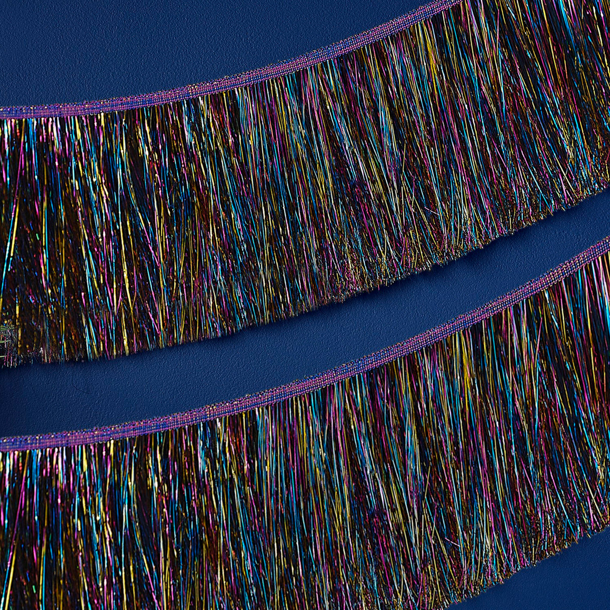 Vibrant multicolored tinsel garland for festive holiday decoration, 20cm x 2m, plastic-free and recyclable packaging.