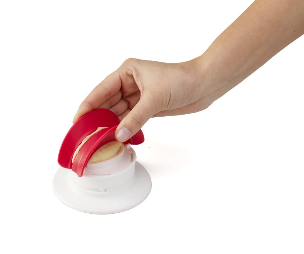 Chef'n Pocket Machine™ for making homemade appetizers with sealed pockets, suitable for various dough and fillings.