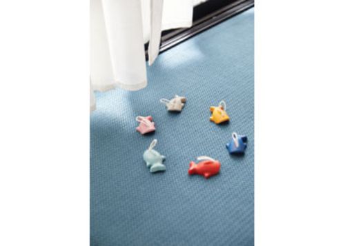 Colorful wooden fishing game with magnetic rod for kids, enhancing motor skills and encouraging cooperative play.